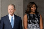 George W Bush and Michael Obama, George W Bush, george w bush passing michael obama some candy is internet s new obsession, Michael obama
