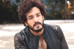 Nagarjuna and Akhil film, Nagarjuna 100th film breaking updates, nagarjuna s 100th film will have akhil in a crucial role, Akhil movie
