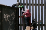 punjabis crossing mexico border, entering US via mexico, video clip shows punjabi women children crossing border fence into u s, Mexico border punjabis crossing mexico border, entering US via mexico, video clip shows punjabi women children crossing border fence into u s, Mexico border