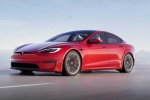 Tesla new electric car details, Tesla new electric car, tesla to launch electric hatchback without a steering wheel, Tesla car without steering