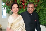 Mukesh Ambani latest, Mukesh Ambani breaking, mukesh ambani to attend donald trump inauguration, Lady