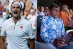 Indian origin boy reading book in Wimbledon 2019 Clash of Tennis, Wimbledon 2019 Clash of Tennis, roger federer vs rafael nadal semi final indian origin boy seen engrossed in his book during wimbledon 2019 clash of tennis, Rafael